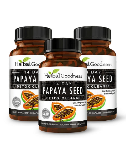 Three amber glass bottles of papaya seed powder capsules 600mg with black caps for intestinal health and herbal goodness